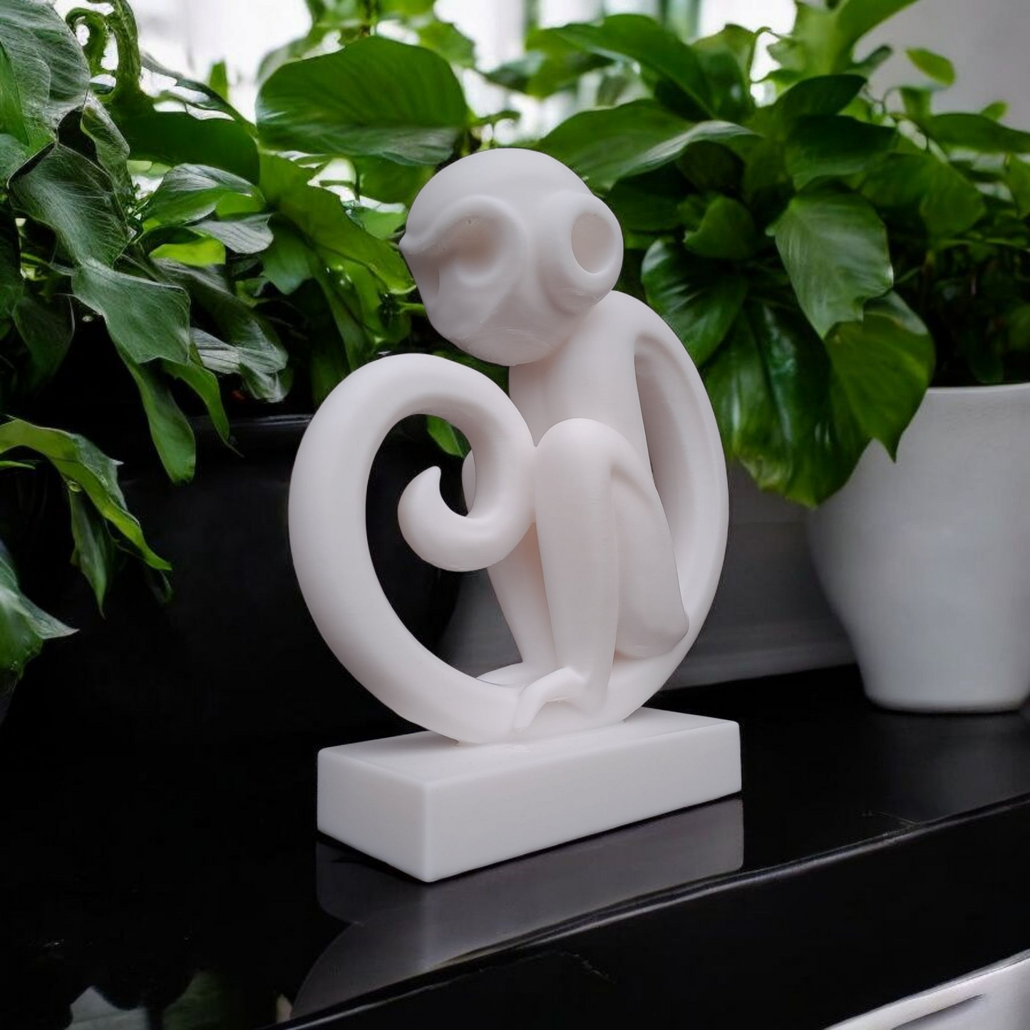 Minimalistische Affen Figur „Monkey Magic“ – Skulptur
